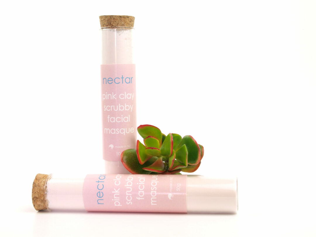 pink clay in tubes with plant